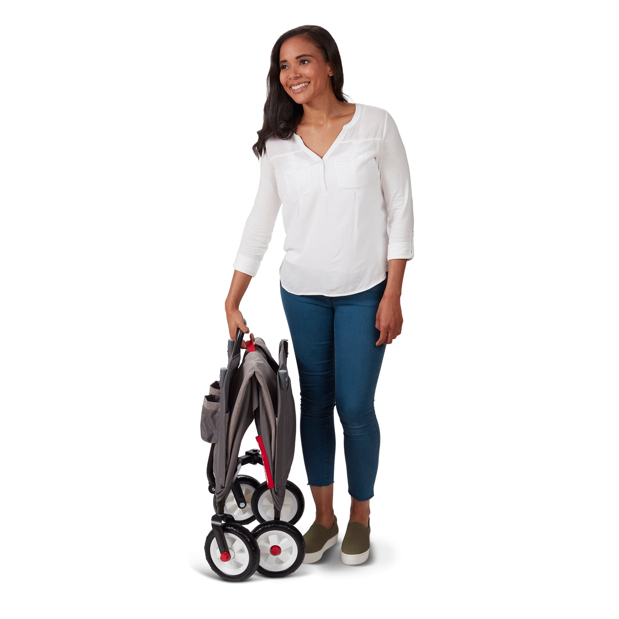 Woman holding a folded wagon on a white background
