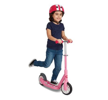 Girl Riding Kick & Glide Scooter Pink