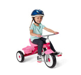 Girl riding Pink Rider Trike