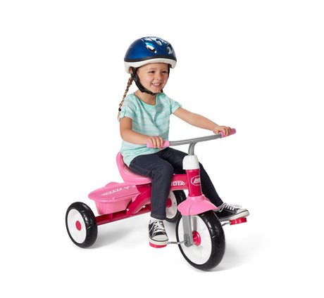 Girl riding Pink Rider Trike