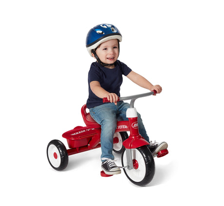 Boy riding Red Rider Trike