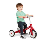 Boy riding Triple Play Trike in Ride-On Mode