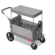 Gray folding wagon with a canopy, pull handle, and adjustable push bar on a white background
