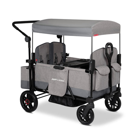 Gray four kid stroller wagon with a canopy and rear storage bag on a white background