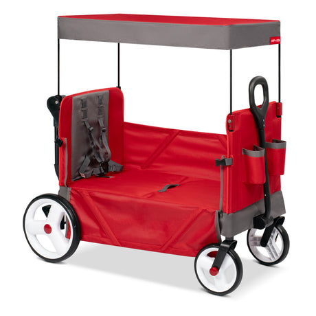 A red and gray wagon shown with the side zipped down displaying the bench seating mode