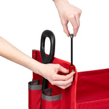 Close-up of a person's hand pulling up the canopy pole that stores inside the wagon frame