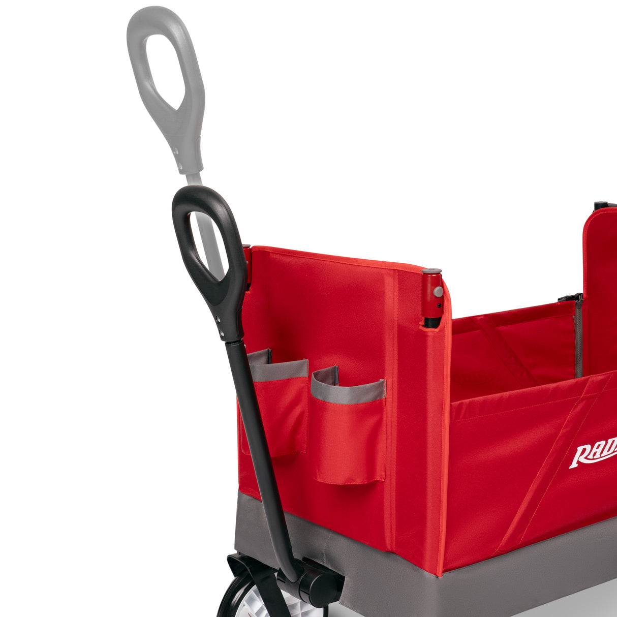 Close-up of the front pull handle of the red wagon with an overlay showing it extends longer