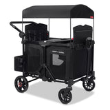 Black four kid stroller wagon with tall sides a canopy and rear storage bag on a white background
