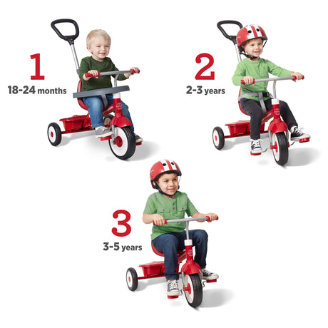 Three children shown riding red tricycles on a white background, each labeled with a number and age range (18-24 months, 2-3 years, 3-5 years). The tricycles have push handles and different handlebar heights, showing progressive stages of use.