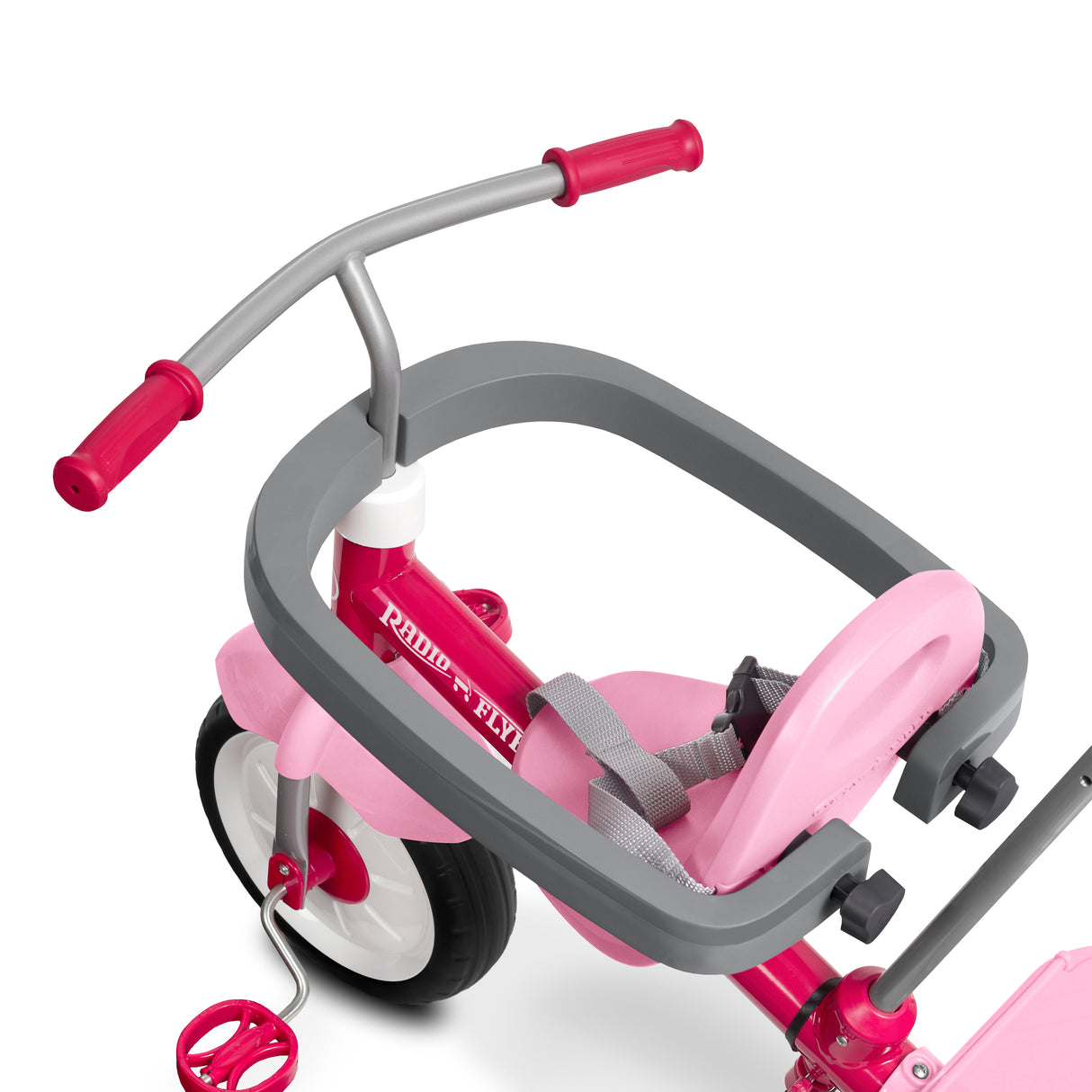 A pink and gray children's tricycle with a seat belt guard, featuring a pink frame, pink grips, and a white-and-black front wheel on a white background.