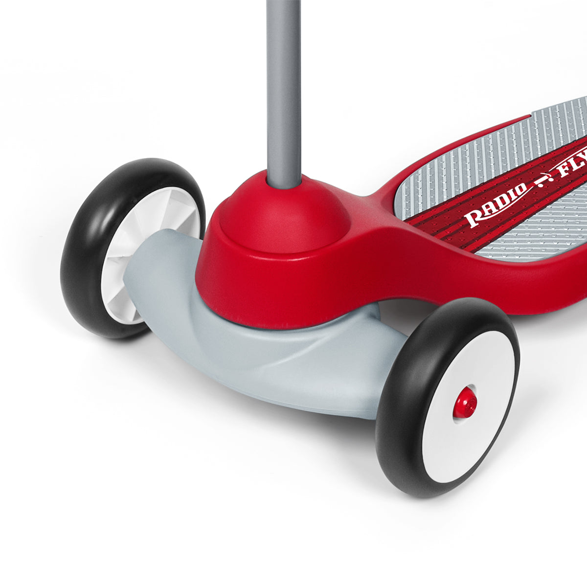Close-up view of the two front wheels of the red scooter