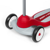 Close-up view of the two front wheels of the red scooter