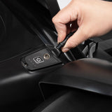 Hand plugging a cable intothe go-kart charging port