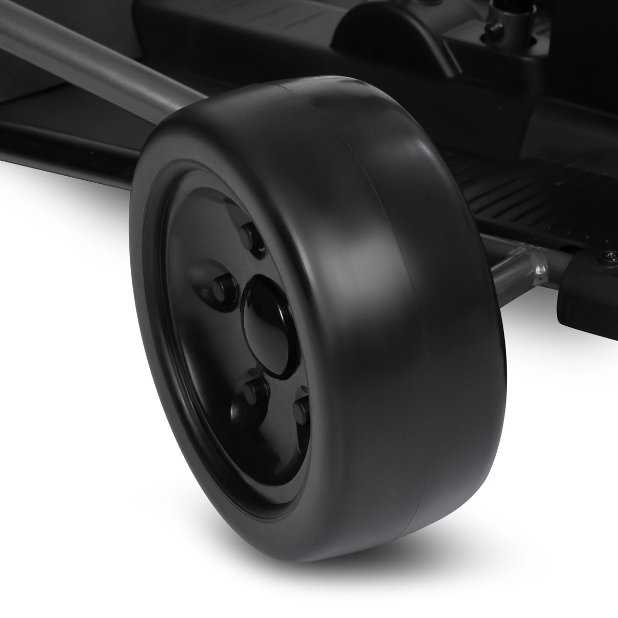 Close up of a black wheel on a white background