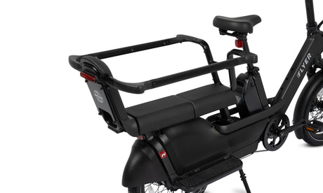 Black cargo bike with a rear child carrying hoop on a white background