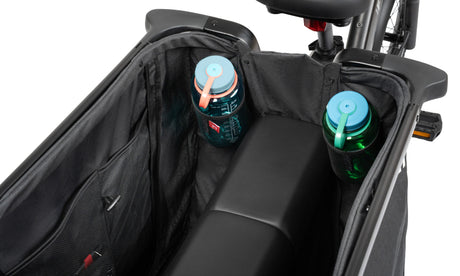 Close up of water bottles in the cupholder pouches inside the fabric liner