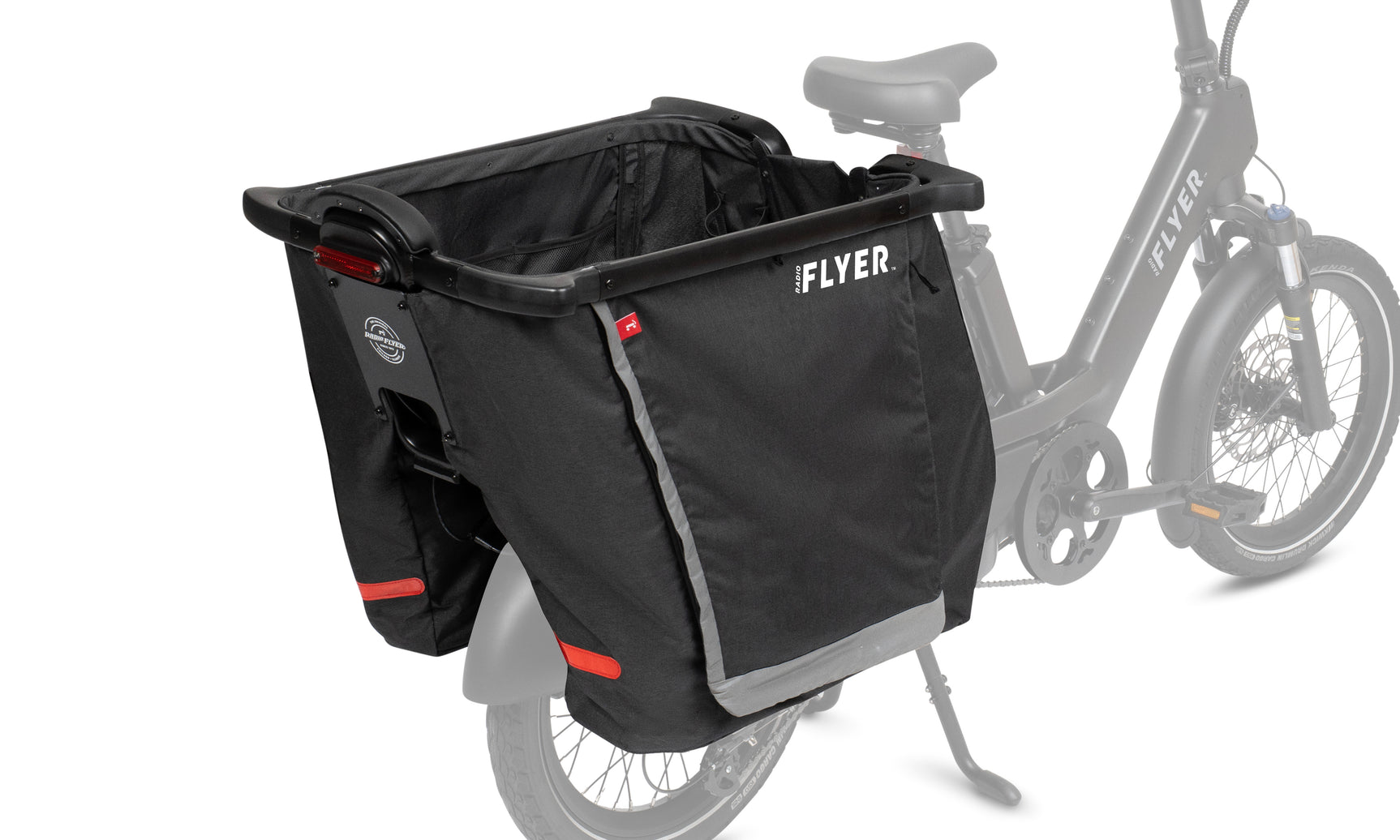 Black cargo hoop fabric liner on the back of a black electric bike on a white background