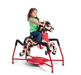 Girl riding Freckles: Plush Interactive Riding Horse