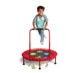Boy Jumping on Game Time Interactive Indoor Kids' Trampoline with Lights & Sounds