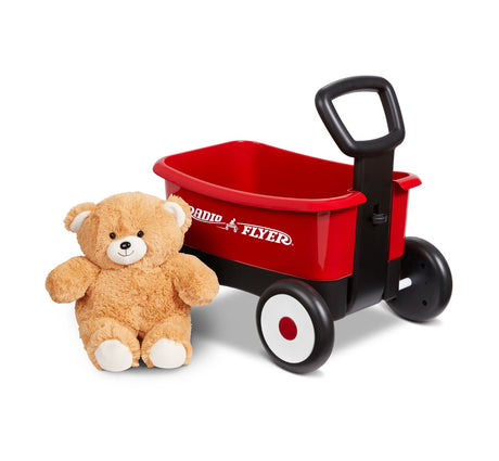 teddy bear and red walker wagon