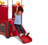 Boy Sliding Down Play & Fold Away Fire Station's Built In Slide
