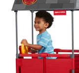 Boy Using Play & Fold Away Fire Station's Attached Rotating Steering Wheel