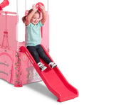 Girl sliding down built-in slide