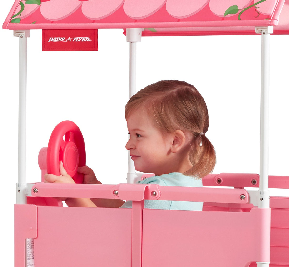 Girl playing with built-in rotating steering wheel