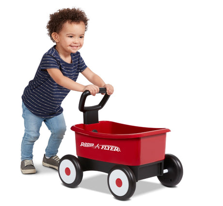 Boy Pushing Push & Pull Walker Wagon with Garden Tools