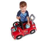 Boy storing ball in Tinker Truck® with Lights & Sounds