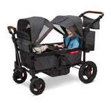 Two children sitting inside Voya™ Stroller Wagon